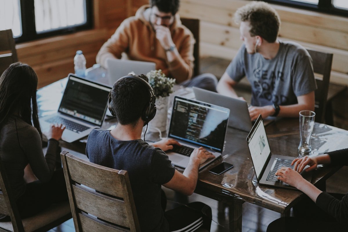 WP Helper Tools founders collaborating on a fixed-scope Micro-SaaS MVP