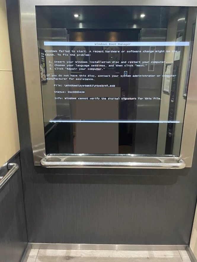 Smart Mirror Shows Dumb Windows Error in Elevator